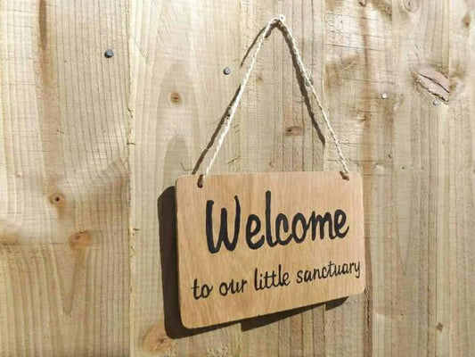 Welcome to our sanctuary oak wood sign
