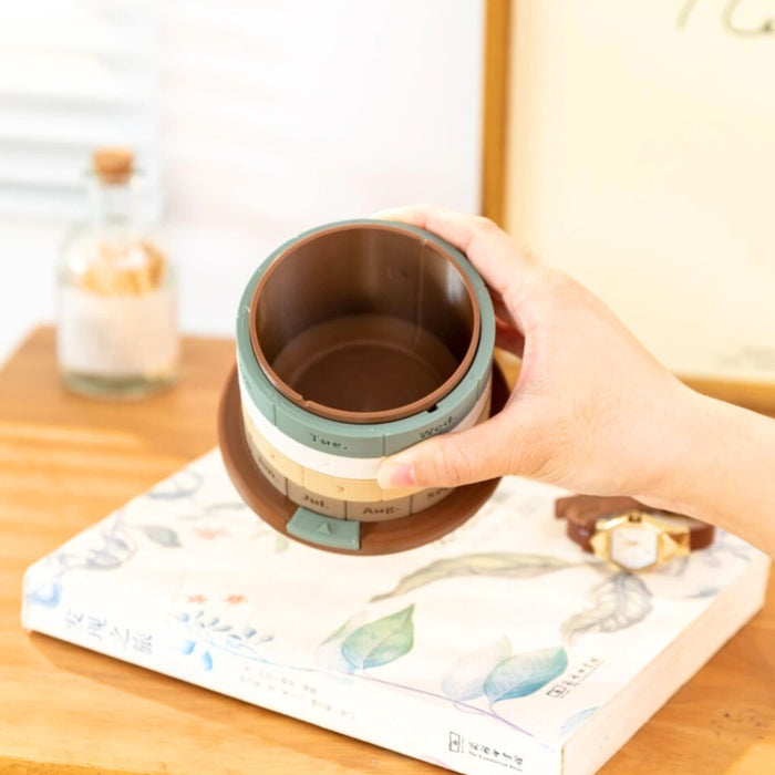 Rotating Perpetual Calendar Ornament with Hidden Storage