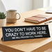 “You Don’t Have to Be Crazy to Work Here” Funny Office Desk Sign