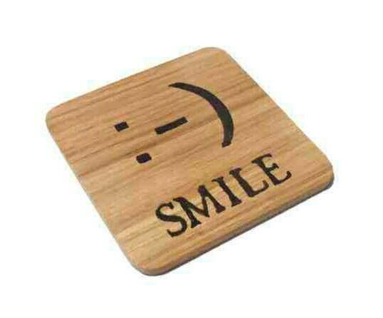 Smiley face emoticon coaster